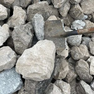 riprap-gravel-stone-limestone-rock-large-decorative-stabilization-aggregate-natural-green-milestone-trucks-supplier